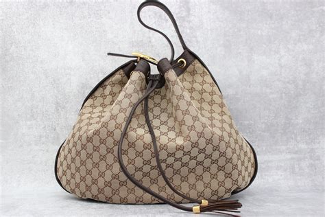 gucci interlockingicon shoulder bag modelli tela|gucci clutch bag.